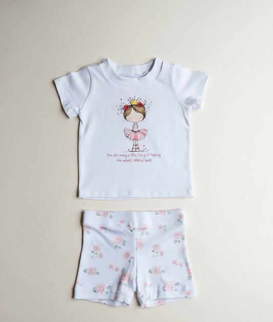 Children's t-shirt and shorts set with a printed design on a beige background
